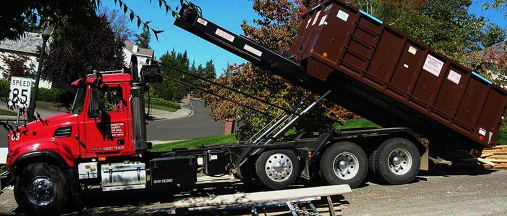 Drop box delivery truck